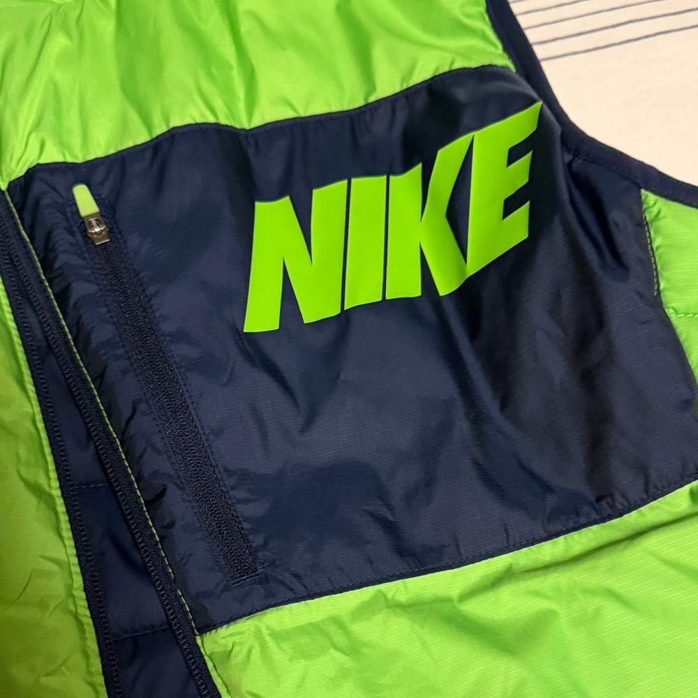 Women’s Nike Seahawks Navy and Green Reversible Puffer Vest - Picture 3 of 7